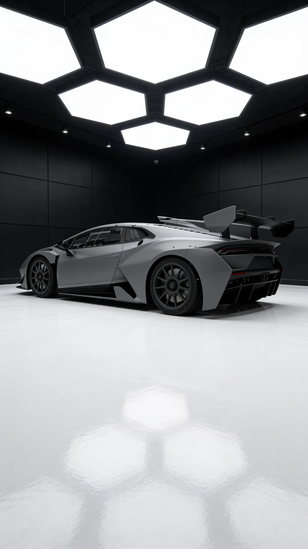 Lamborghini Huracán Super Trofeo — rear three-quarter view showing the swan-neck wing and diffuser