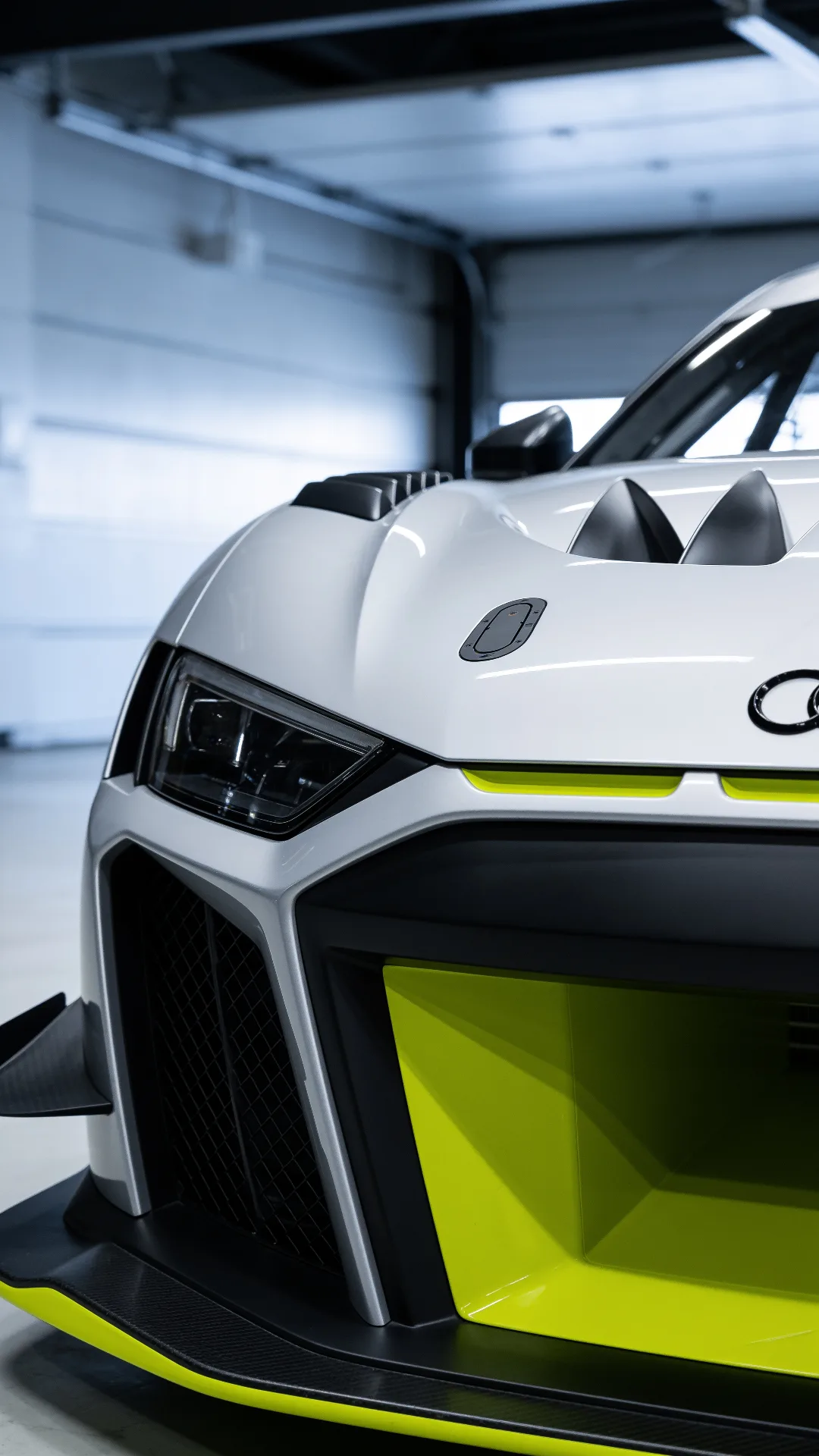 Audi R8 GT2 — close-up of the front splitter, canards, and hood NACA ducts